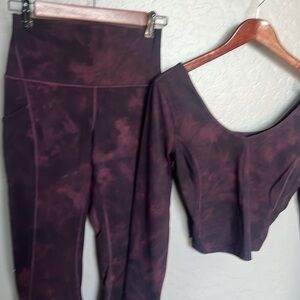 This is a LuLuLemon matching set -  Size 6 -deep purple and black.  NEVER WORN